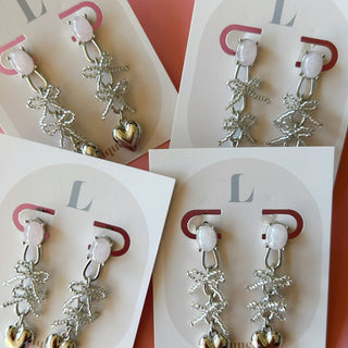 connect heart ribbon clip on earrings