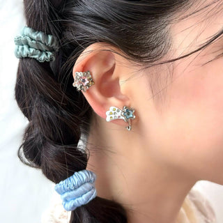 TOY Star clip on earrings