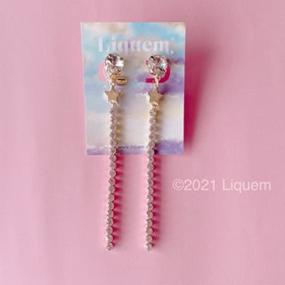 Liquem / Star long clip on earrings