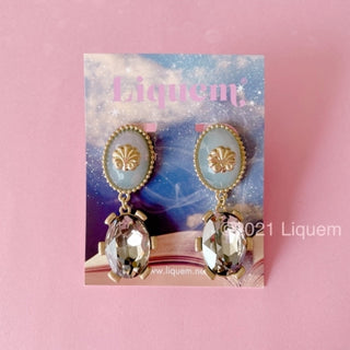 Liquem / symbol clip on earrings (BLGRY)