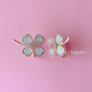 Liquem / clover clip on earrings