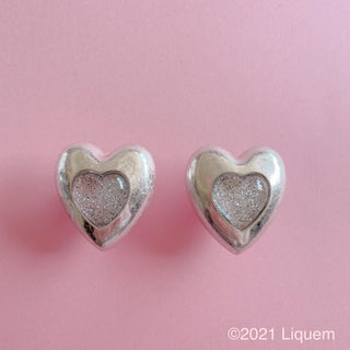 Liquem / heart disc clip on earrings (SLV)