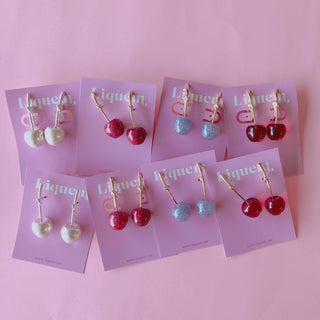 Liquem / Kids cherry clip on earrings (lavender glitter)